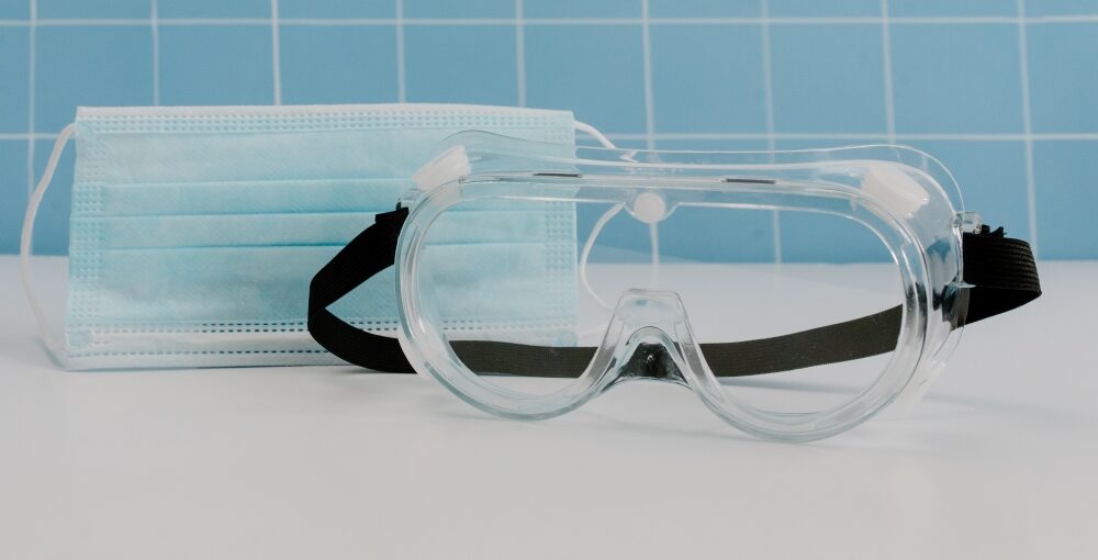 Image of a pair of safety goggles and a face mask - Patient Guard uses this image to represent its Medical Device and IVD Regulatory and Quality Assurance Related Content.