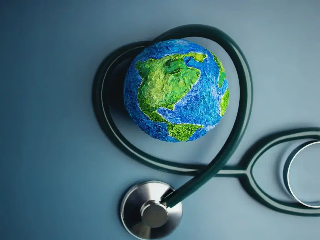 Image of a stethoscope around a ball of the globe - image representing Patient Guard as a medical device regulatory and quality assurance consultancy