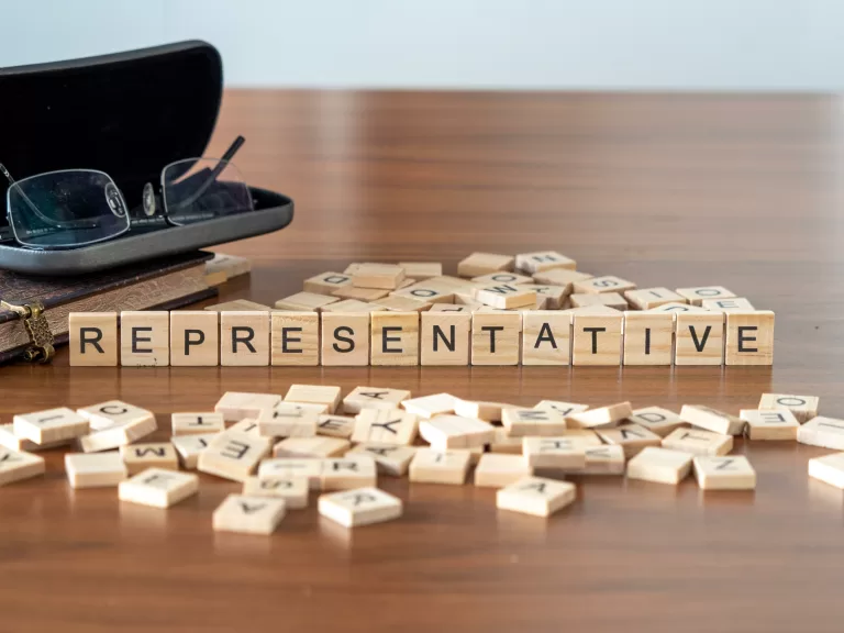 Image with the word representative spelt out in scrabble letters. This image is used by patient guard to represent their Authorised Representative Services in the EU and the UK (Repsonsible Person) for Medical Devices and IVD manufacturers