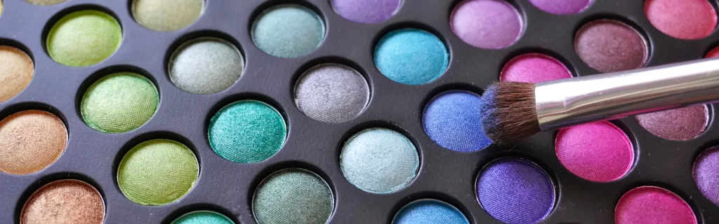 Cosmetic colour pallet such as eye shadows, contains all colours (colors) making a rainbow effect. Used by patient guard to represent their cosmetic regulatory services.
